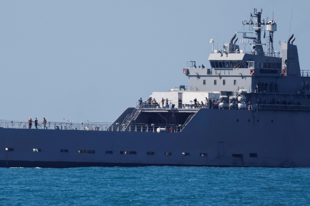 An Israeli navy vessel approaches Ashdod Port, carrying people detained by Israel from the Global Sumud Flotilla trying to deliver aid to Gaza, in southern Israel, October 2, 2025. — Reuters pic