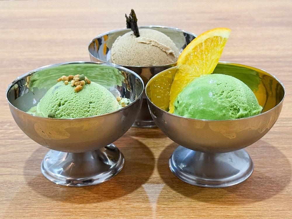 Various flavours are churned in small batches include the crowd favourite Genmaicha (left), Oolong Tea (top) and an unusual Matcha Orange (right). —  Picture by Lee Khang Yi