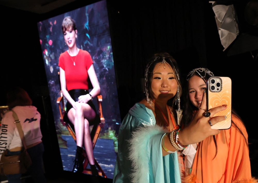 Fans of US musician Taylor Swift, also known as ‘Swifties,’ attend ‘The Life of a Showgirl’ pop-up at Spotify’s three-day immersive experience in New York on October 2, 2025, to celebrate Swift’s upcoming album ‘The Life of a Showgirl’. — AFP pic