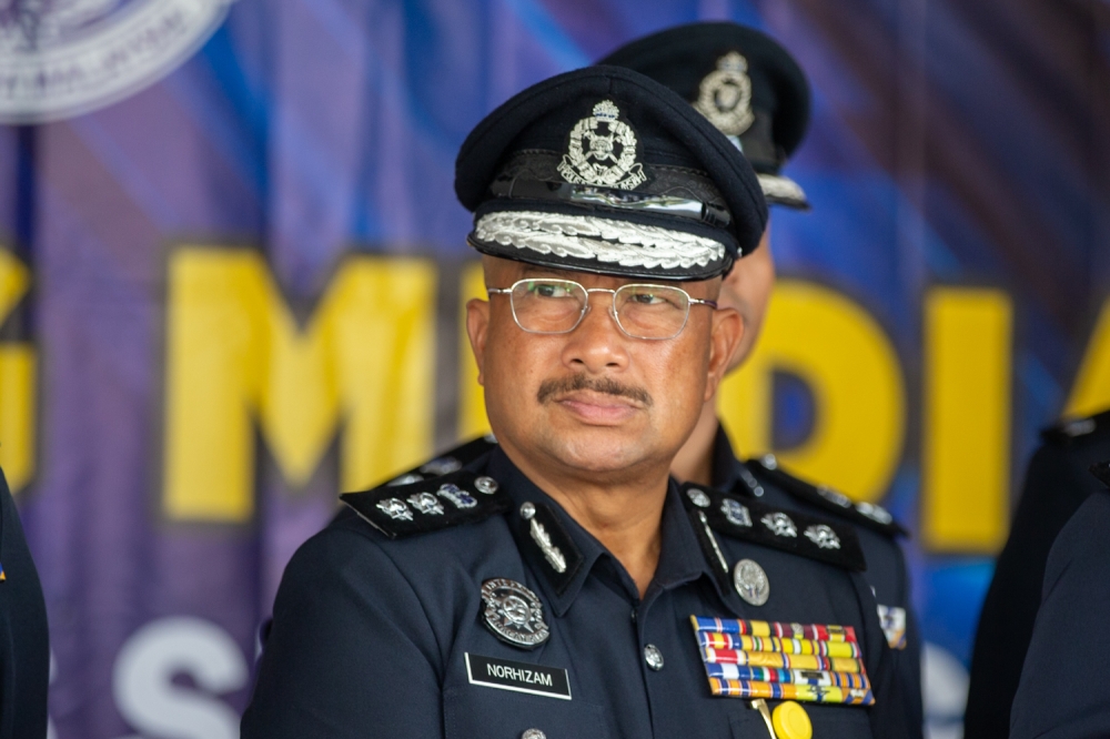 Sepang police chief ACP Norhizam Bahaman holds a press conference at the Sepang District Police Headquarters on May 27, 2025. — Picture by Raymond Manuel