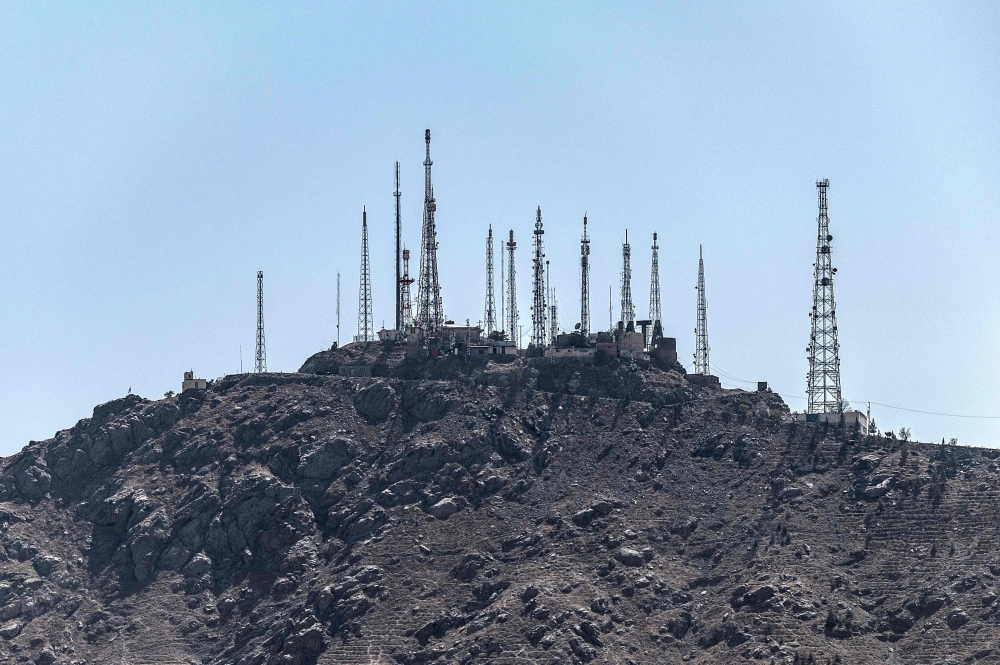 A general view shows the telecommunication towers installed on a hilltop in Kabul on September 30, 2025. — AFP pic