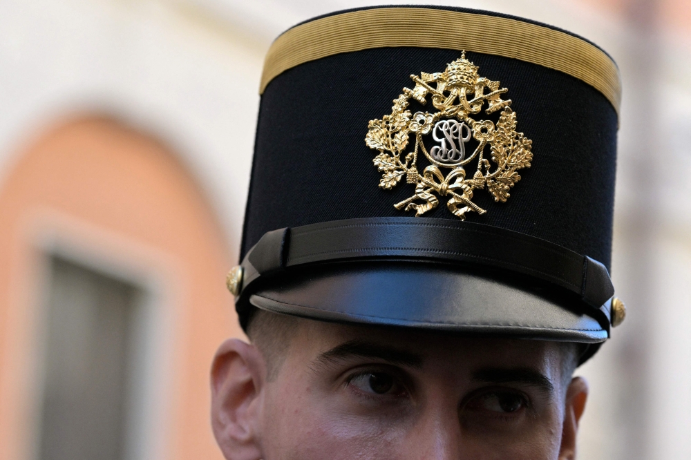 The uniforms, which cost about 2,000 euros each (RM9,883), were made by a workshop in Switzerland and financed by private funds. — AFP pic