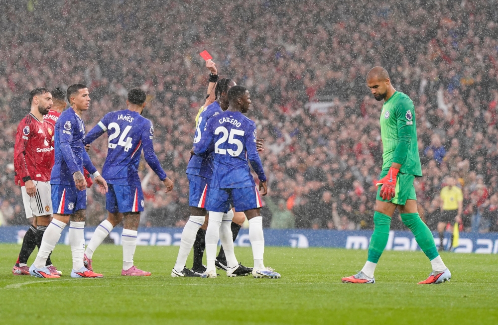 Robert Sanchez of Chelsea is shown a red card during the Manchester United vs Chelsea Premier League match at Old Trafford, Manchester, September 20, 2025. — Andrew Yates/Sportimage pic via Reuters 