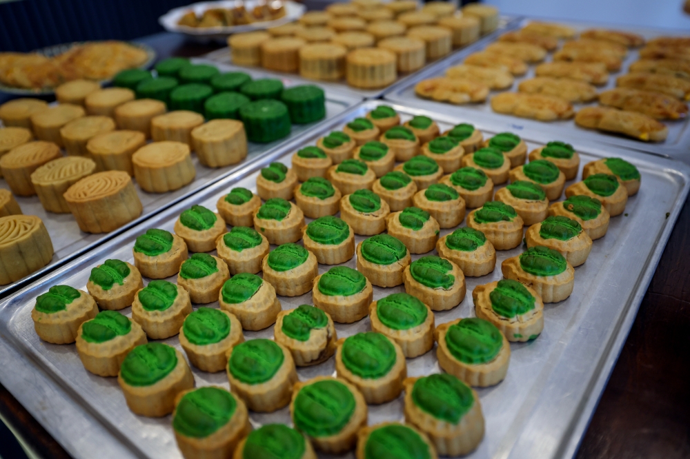 Mooncakes, a traditional Chinese dessert synonymous with the Mid-Autumn Festival, are now presented with a modern twist when a local entrepreneur introduces two new flavours: pineapple and chocolate. — Bernama pic