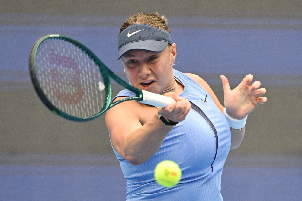 USA’s Amanda Anisimova hits a return to USA’s Coco Gauff during their women’s singles semi-final match at the China Open tennis tournament in Beijing October 4, 2025. — AFP pic 