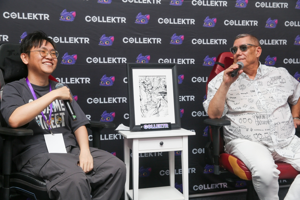 Marvel legend Bob Layton and Ruby Ling at Saturday's soft launch of the Collektr Experience Centre, pictured with the artwork they created together. — Picture by Choo Choy May