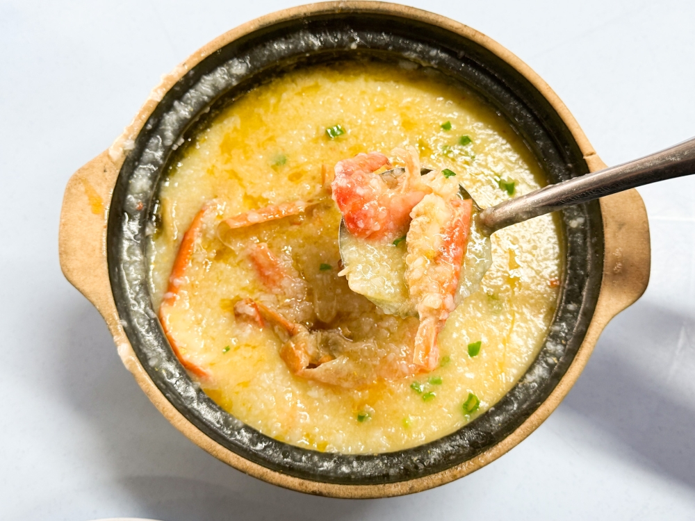 Water Prawn Porridge hits differently compared to the other porridges with its decadent freshwater prawns. — Picture by Lee Khang Yi