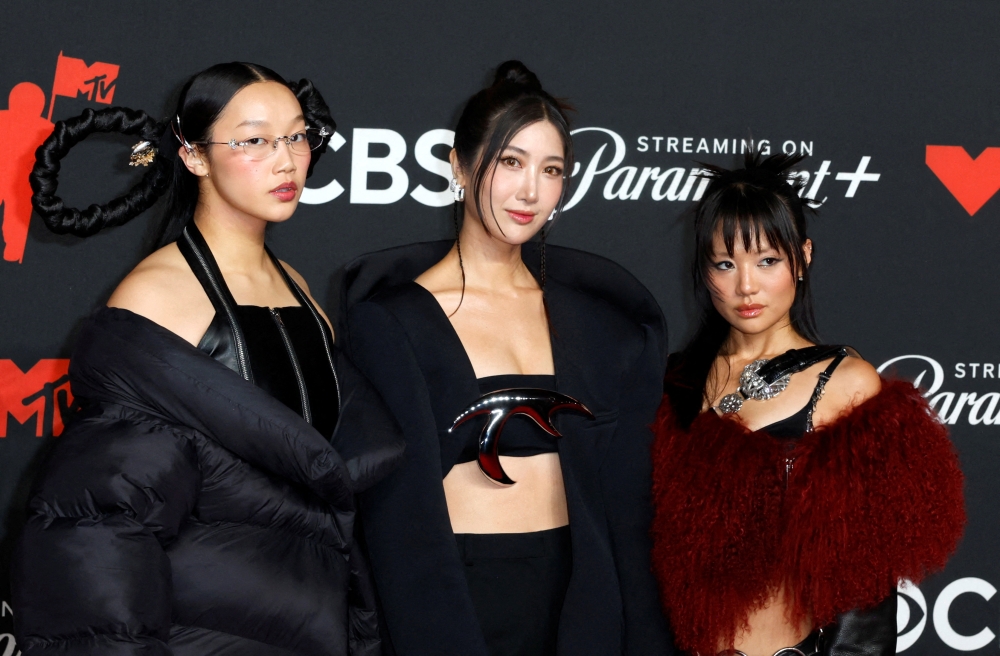 HUNTR/X vocalists Audrey Nuna, EJAE and Rei Ami pose on the red carpet at the 2025 MTV Video Music Awards in New York September 7, 2025. — Reuters pic