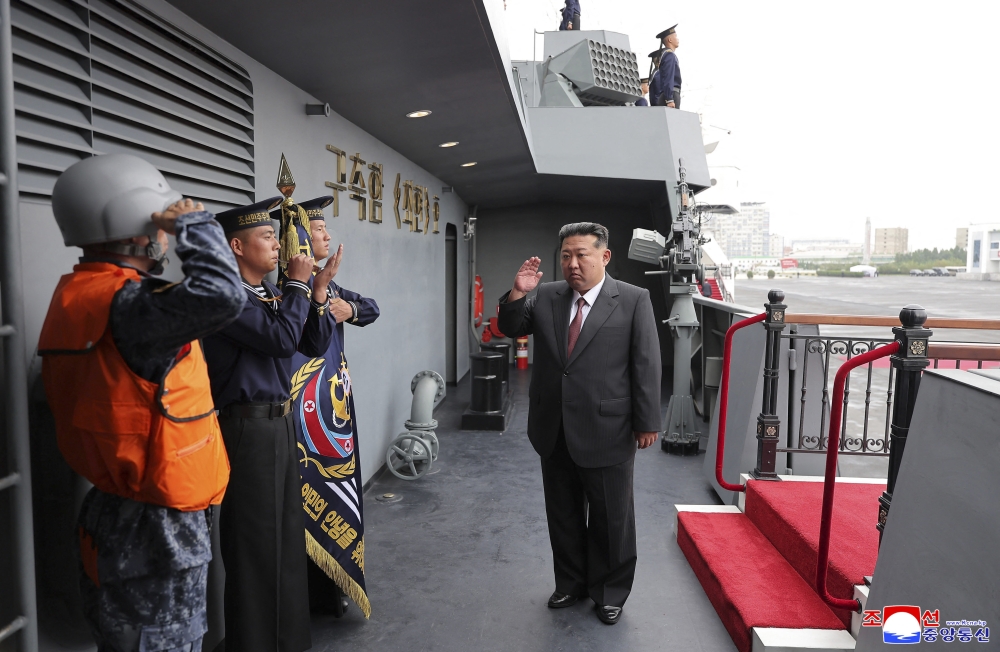 This picture taken on October 5, 2025 and released from North Korea’s official Korean Central News Agency (KCNA) via KNS on October 6, 2025 shows North Korean leader Kim Jong Un (centre) inspecting the naval destroyer “Choe Hyon” of the Korean People’s Army at an undisclosed location in North Korea. — KCNA pic via KNS/AFP