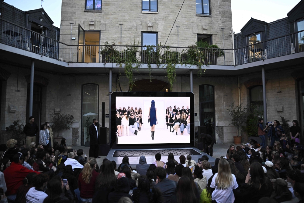 Guests attend a party organised by French influencer Lyas Medini. — AFP pic