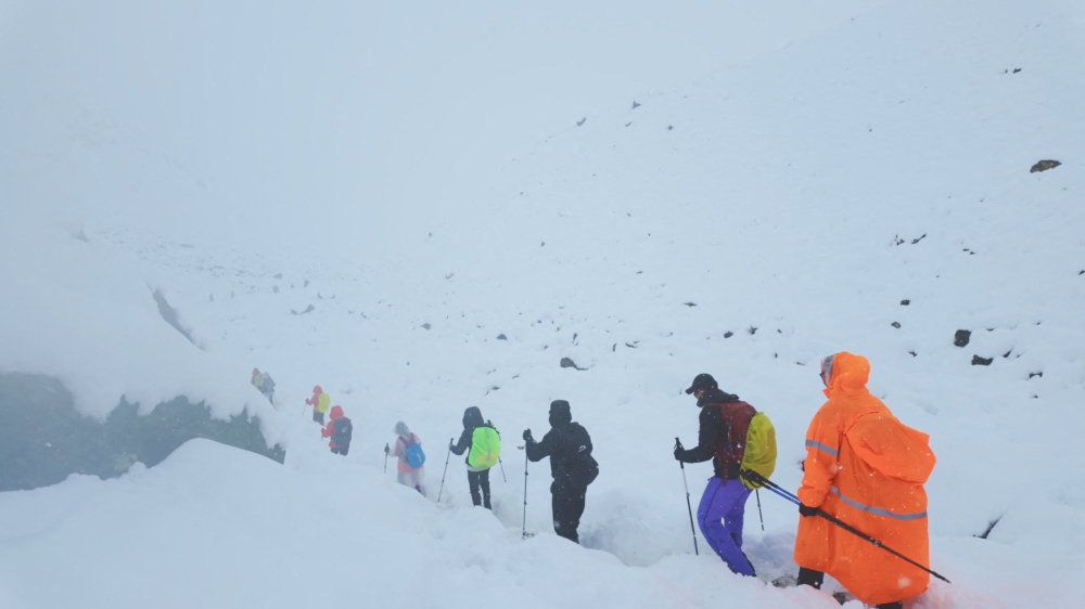 A screen capture from video shows trekkers leaving their campsite, as unusually heavy snow and rainfall pummeled the Himalayas, in the Tibet Region, China, October 5, 2025. — Reuters pic/Geshuang Chen/Handout