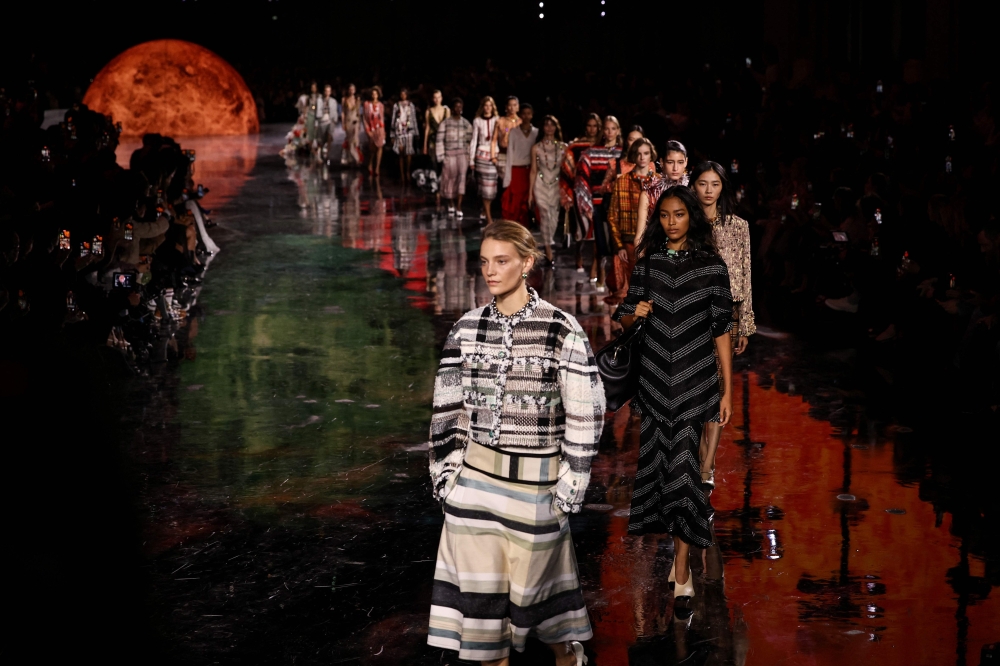 Models present creations by Chanel at the end of the Women Ready-to-wear Spring-Summer 2026 collection as part of the Paris Fashion Week, at the Grand Palais in Paris on October 6, 2025. — AFP pic