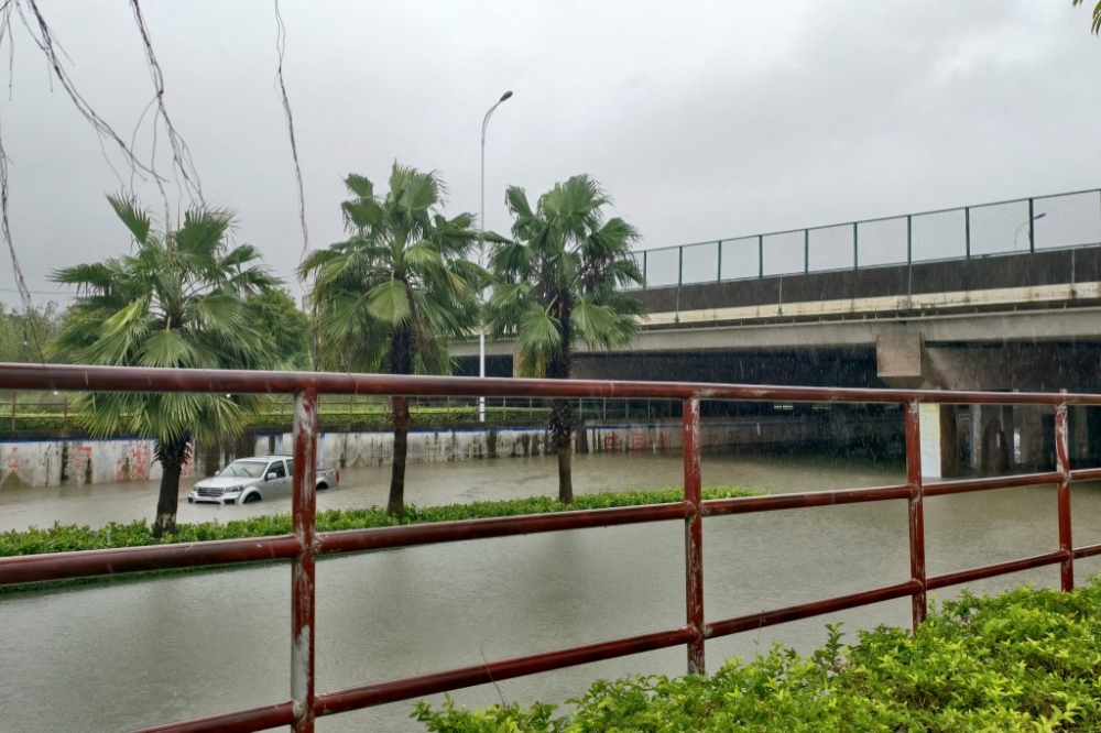 This photo taken on Oct. 6, 2025 shows a waterlogged area in Qinzhou City, south China's Guangxi Zhuang Autonomous Region. Typhoon Matmo, the 21st named storm of the 2025 Pacific typhoon season, made landfall along the coast of Guangxi yesterday. The storm has also reached the northern part of Vietnam. — Xinhua pic via AFP