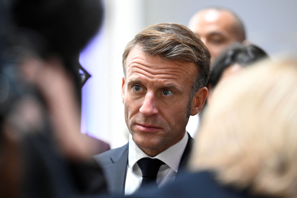 President Emmanuel Macron was yesterday under pressure even from allies to find a rapid solution to France’s political deadlock, after his first prime minister and one-time ally urged him to resign for the sake of the country. — Jean-Christophe Verhaegen/Pool/Reuters pic