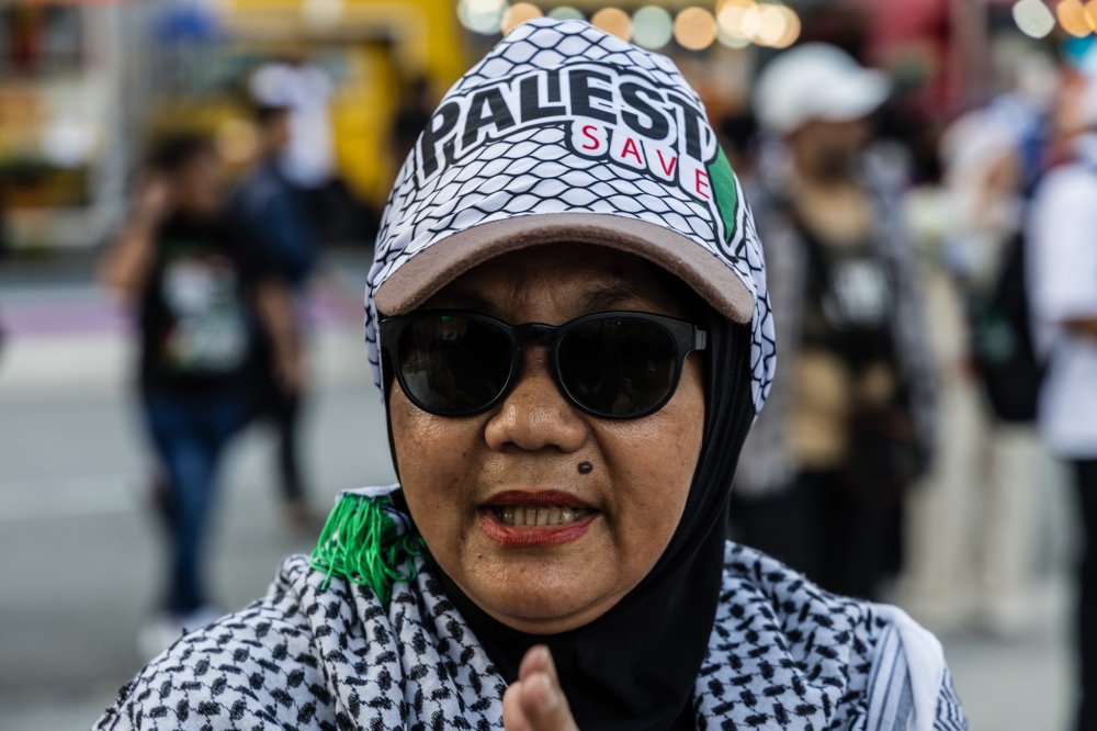 Poziyah Abu, 67, a retiree, said it is important for Malaysians to show solidarity by attending the rally. — Picture by Firdaus Latif
