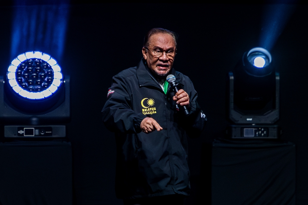 Prime Minister Datuk Seri Anwar Ibrahim speaks during the Gaza Solidarity Gathering at Axiata Arena in Bukit Jalil, Kuala Lumpur on October 8, 2025. — Picture by Firdaus Latif