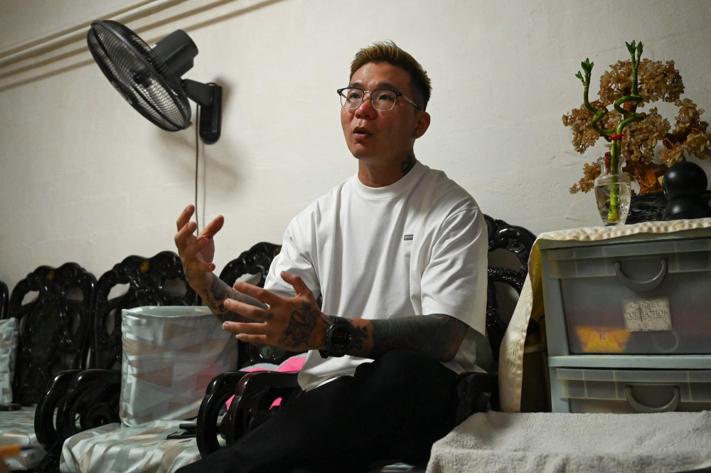 This photograph taken on September 18, 2025 shows Singapore’s Delfard Tay talking about his late daughter Shermaine, in Singapore. — AFP pic 