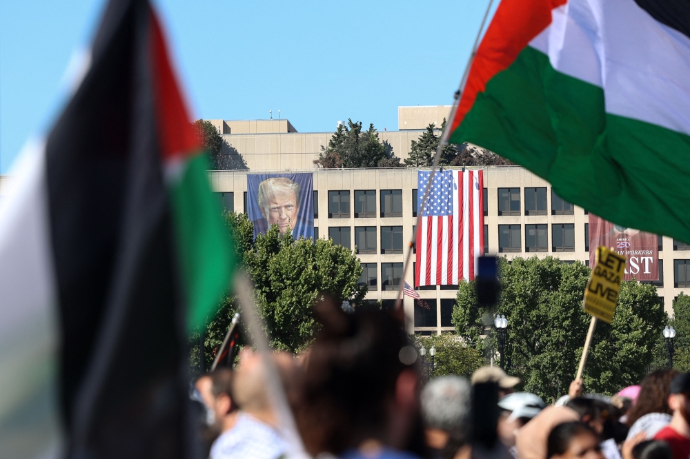 Protesters march during the ‘Rise Up for Gaza’ international day of action on Capitol Hill in Washington, DC on October 4, 2025. — AFP pic 
