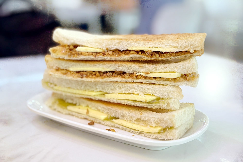 Crunchy Peanut Butter Toast and Pandan Kaya Butter Toast. — Picture by CK Lim