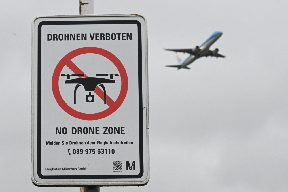 A sign with a drone ban is displayed outside the airport in Munich, Germany October 6, 2025. — Reuters pic