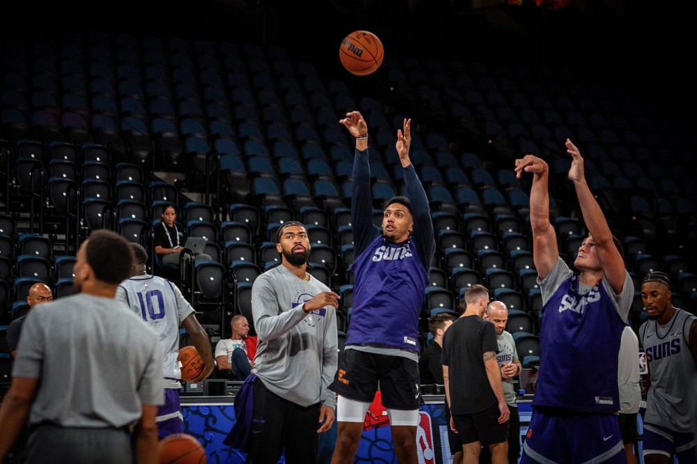 Phoenix Suns players practice shooting during a session ahead of the NBA pre-season games, at the Venetian Arena in Macau on October 9, 2025. The Brooklyn Nets and the Phoenix Suns will play sell-out games on October 10 and today in Macau, a special administrative region of China close to Hong Kong. — AFP pic 
