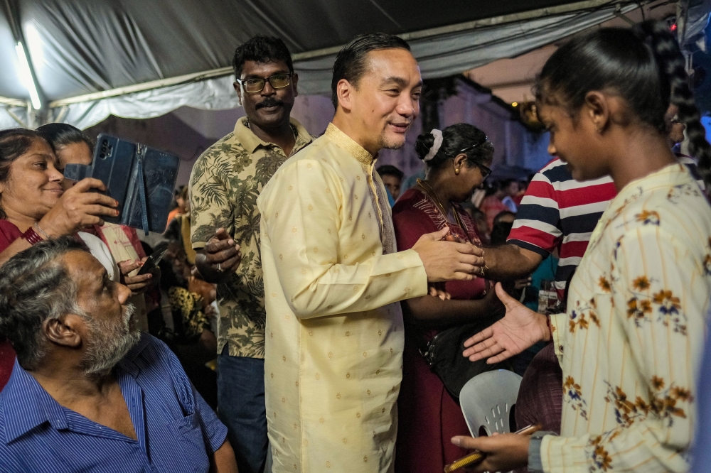 Johor Menteri Besar Datuk Onn Hafiz Ghazi (centre) greets members of the Indian community at the launch of the Johor Deepavali Carnival in Little India, Johor Baru, October 12, 2025. — Bernama pic 