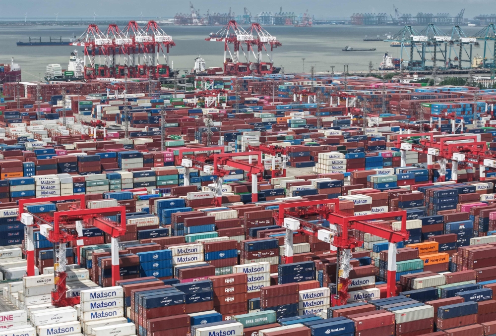 Containers are seen at the port in Shanghai on October 13, 2025. China's exports to the United States jumped more than eight percent in September from the previous month, official data showed on October 13, following days of worsening trade tensions between the world's top two economies. — AFP pic 