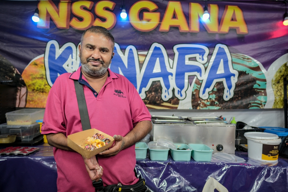 Nagarajan, who is differently abled, has turned his struggles into strength, reinventing the traditional pani puri with a modern touch in the spirit of Deepavali. — Bernama pic