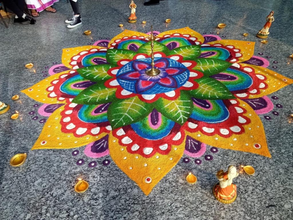 Mehnaga’s ‘kolam’ for Maybank’s Deepavali shoot is packed with vibrant colours. — Picture courtesy of Mehnaga Mathivanan