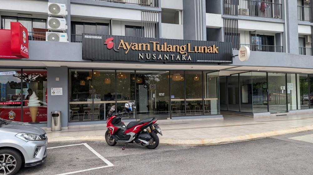 The restaurant is located on the ground floor of an apartment building. — Picture by Ethan Lau