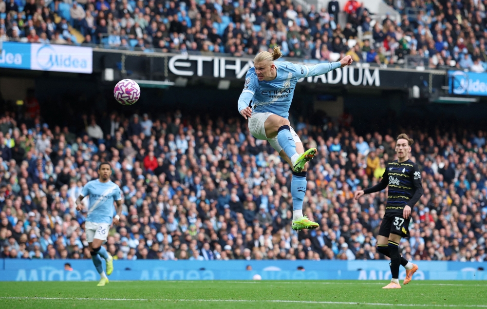 Manchester City’s Erling Haaland scores their first goal during their Premier League match with Everton at Etihad Stadium in Manchester October 18, 2025. — Reuters pic
