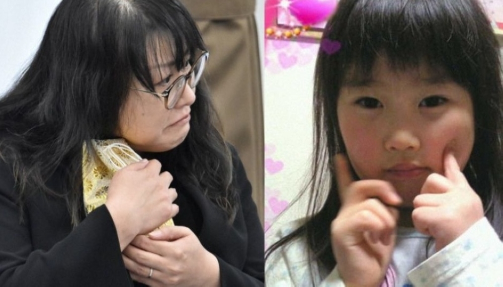 Chiyumi Yamane embraces the urn containing her daughter Natsuse’s remains in Minami-Sanriku, Japan, 14 years after the 2011 tsunami swept the six-year-old away.