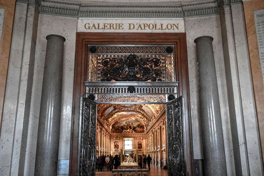 This picture shows the entrance of the ‘Gallerie d’Apollon’ (‘Apollo’s Gallery’) on January 14, 2020 at the Louvre museum in Paris after the reopening of the Gallery following ten months of renovations. France’s Interior Minister Laurent Nunez said that jewellery stolen from the Louvre Museum today in Paris was ‘priceless’. — AFP pic
