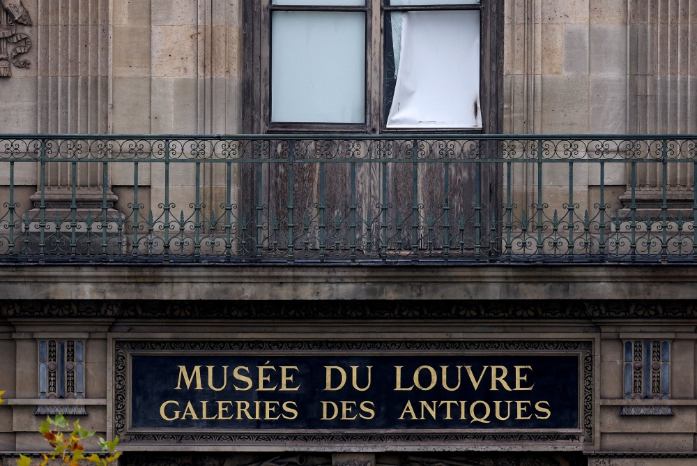 A window believed to have been used in what the French Interior Ministry said was a robbery at the Louvre museum during which jewellery was stolen, in Paris October 19, 2025. — Reuters pic 