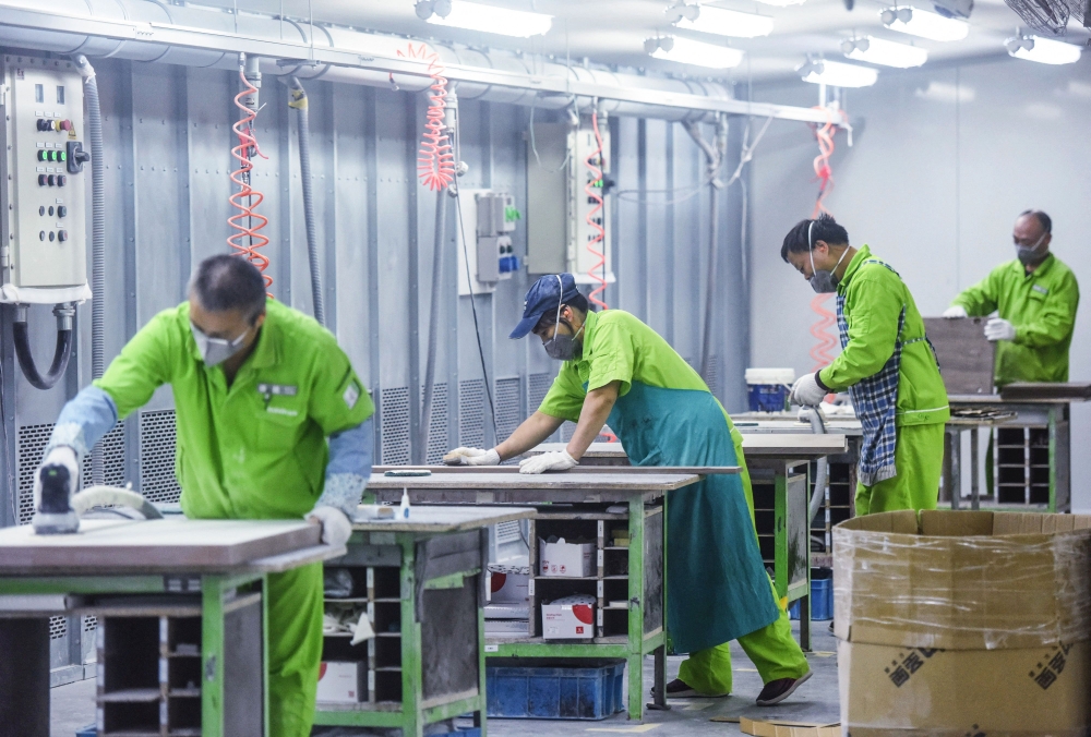 Workers produce furniture at a factory in Hangzhou in China’s eastern Zhejiang province, October 24, 2022. Lim Guan Eng also noted that China’s remarkable success in lifting 800 million people out of poverty through export-led industrialisation has transformed its economy into the world’s second largest — and potentially soon the largest. — AFP pic