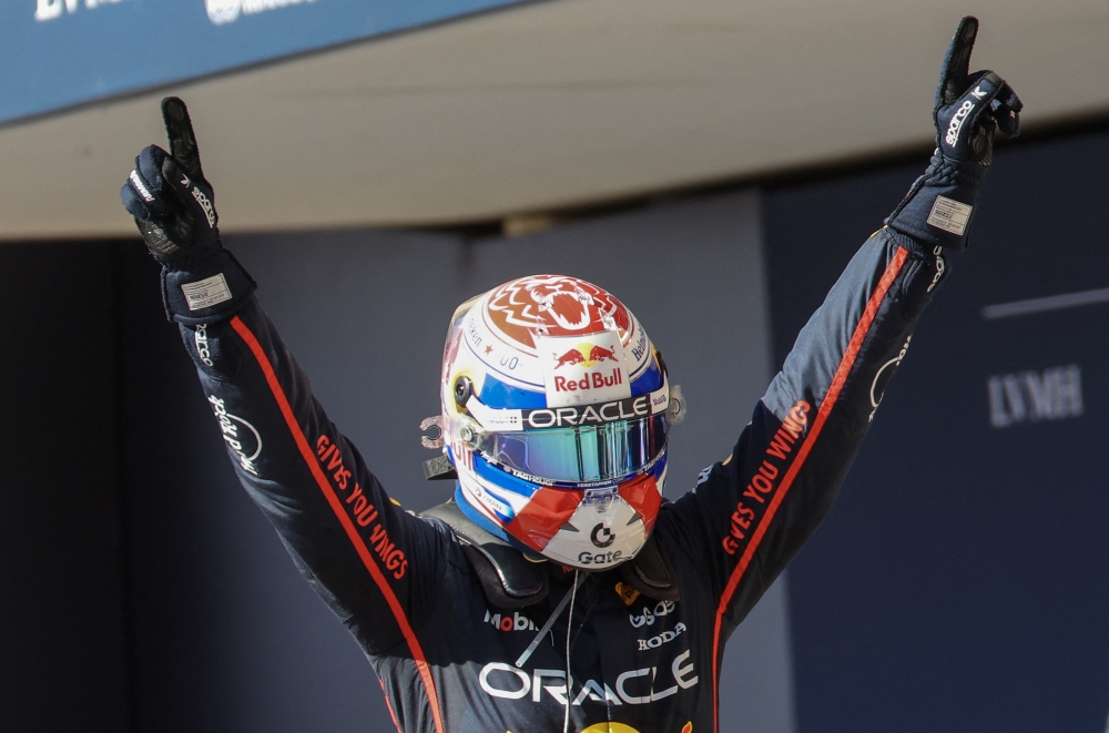 Oracle Red Bull Racing driver Max Verstappen (1) of Team Netherlands, winner celebrates at winners circle at Circuit of The Americas Austin in Texas October 19, 2025. — Thomas Shea-Imagn Images/Reuters pic