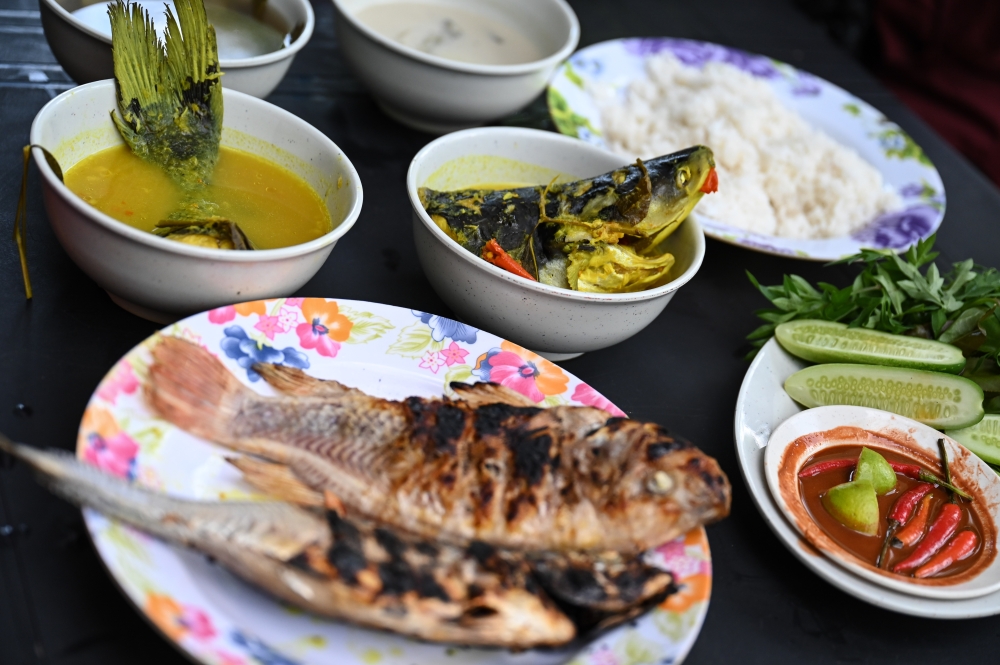 About 20 different dishes are served daily. — Bernama pic