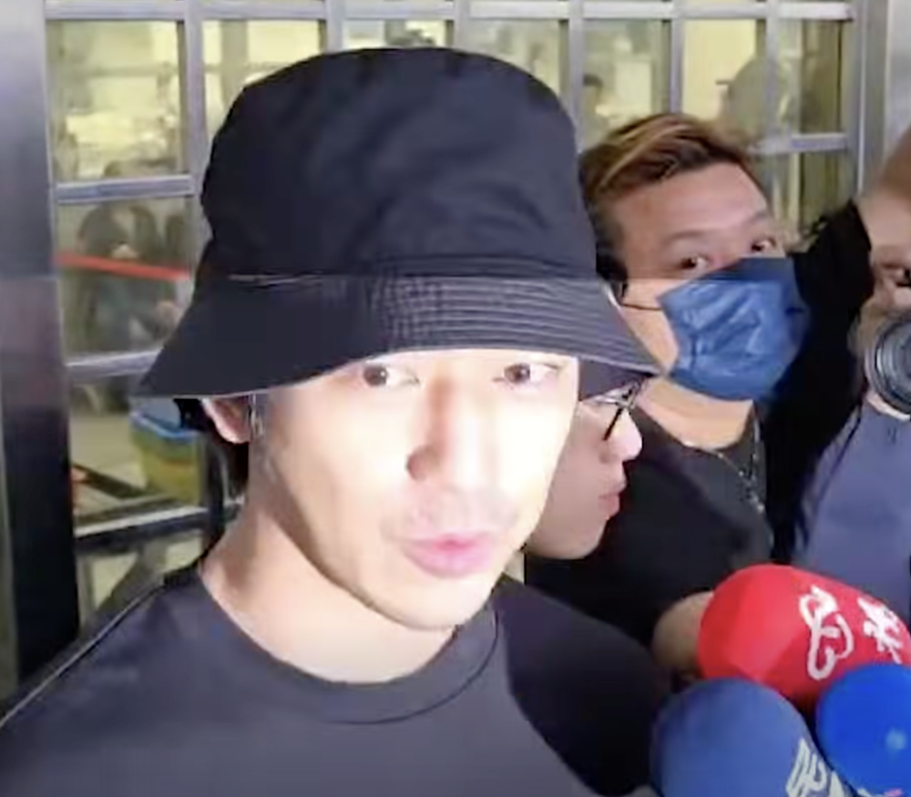 Chen Bolin speaks to reporters after police questioning, expressing regret over what he called an ‘absurd choice’ from his youth amid the draft evasion probe. — Screengrab from Facebook video