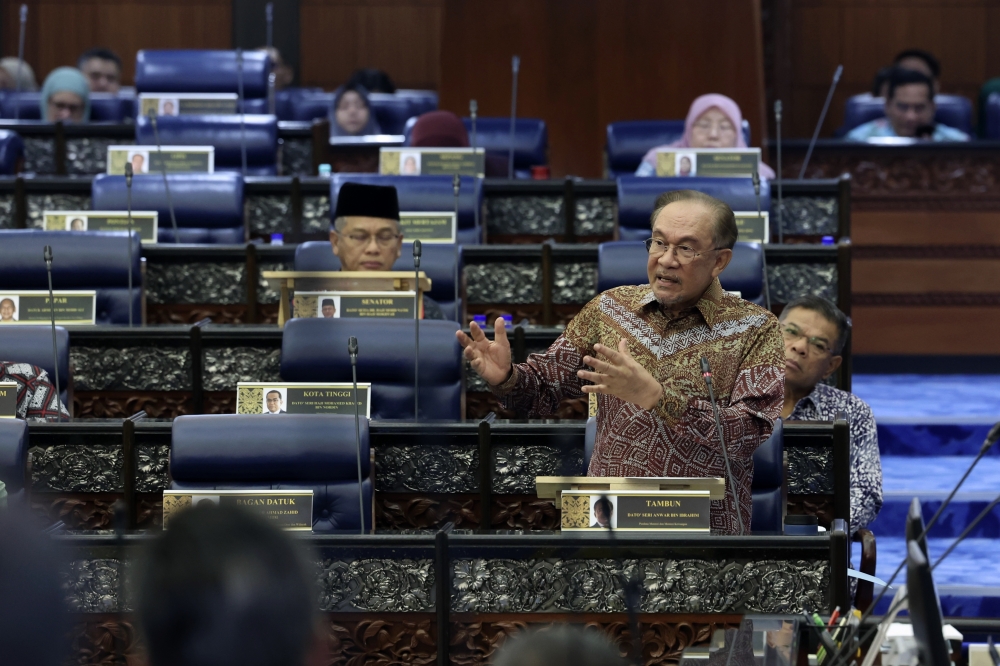 Prime Minister Datuk Seri Anwar Ibrahim speaks at the Third Meeting of the Third Term, 15th Parliament of the Dewan Rakyat at the Parliament Building October 23, 2025. — Bernama pic