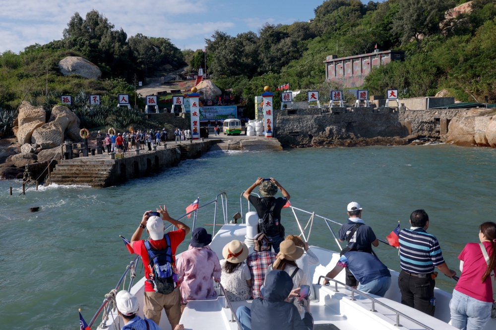 Tourists approach Dadan Island by ferry from Kinmen, Taiwan, October 18, 2025. — Reuters pic