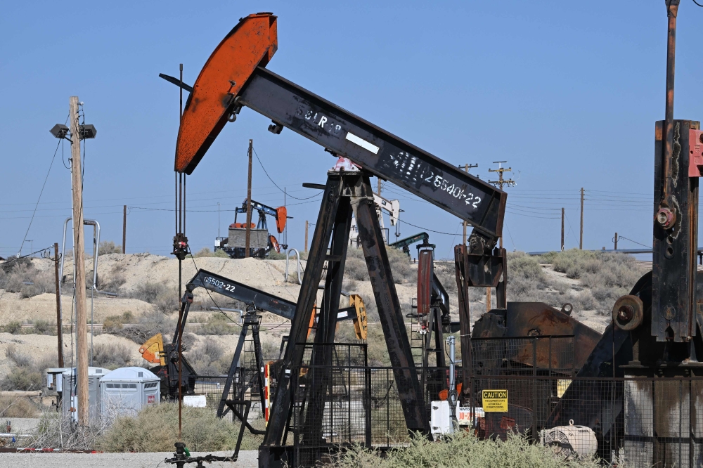 Oil prices climbed sharply after Washington and Brussels imposed new sanctions on Russia’s top energy firms, fuelling concerns over global supply disruptions. — AFP pic