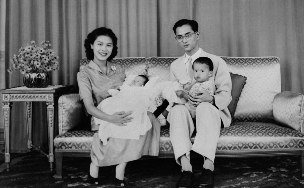 This undated photo taken in June 1955 shows King of Thailand Bhumibol Adulyadej (left), Sirikit Kitiyakara, Queen Mother of Thailand, posing with their children, Princess Maha Chakri Sirindhorn (with her mother) and Crown Prince Maha Vajiralongkorn. — AFP pic