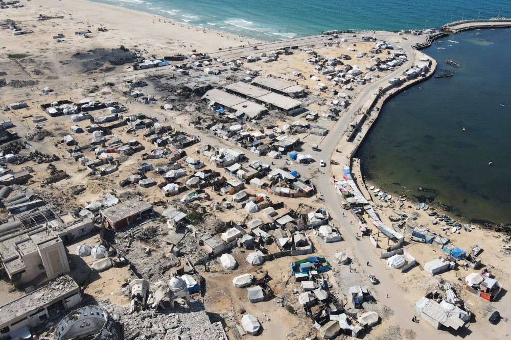 An aerial view shows tents sheltering displaced Palestinians in the war-damaged area surrounding Gaza City's port on October 20, 2025, during a US-brokered ceasefire between Israel and Palestinian factions. — AFP pic 