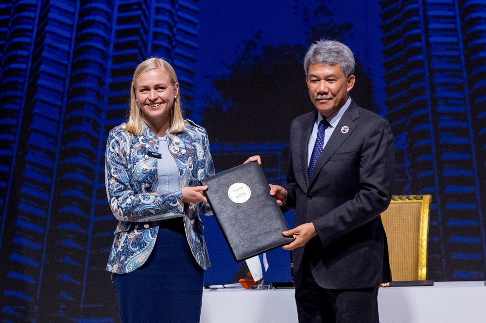 (From left) Finland's Foreign Minister Elina Valtonen and Malaysia's Foreign Minister Datuk Seri Mohamad Hasan pose for a photo during the signing ceremony of the Instrument of Accession to the Treaty of Amity and Cooperation in South-east Asia (TAC) by the Republic of Finland, ahead of the 47th Asean Summit at the Kuala Lumpur Convention Centre, Kuala Lumpur October 25, 2025. — Picture by Firdaus Latif