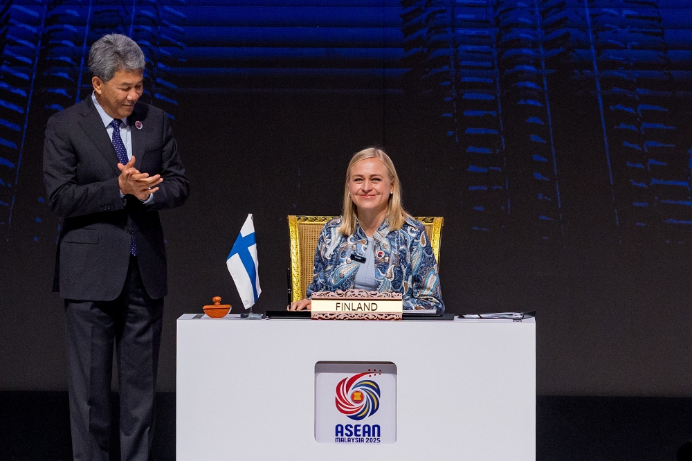 Finland’s Foreign Minister Elina Valtonen and Malaysia’s Foreign Minister Datuk Seri Mohamad Hasan during signing Ceremony of the Instrument of Accession to the Treaty of Amity and Cooperation in South-east Asia (TAC) by the Republic of Finland ahead of the 47th Asean Summit at the Kuala Lumpur Convention Centre, Kuala Lumpur October 25, 2025. — Picture by Firdaus Latif