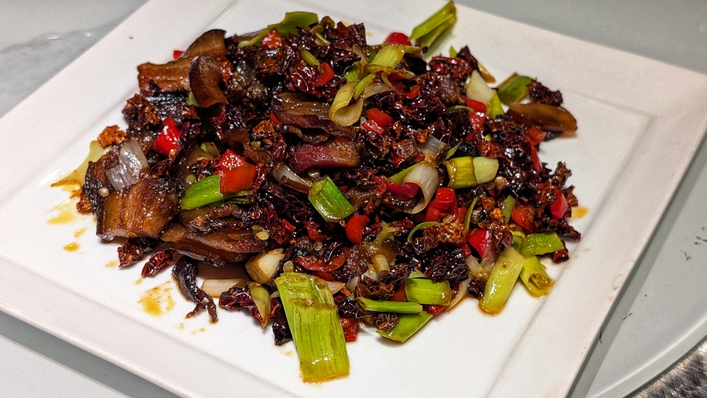 ‘Gan la’ or ‘dry spicy’ is a typical flavour profile of Hunan cuisine, and the chilli-fried smoked pork is a classic example of it. — Picture by Ethan Lau 