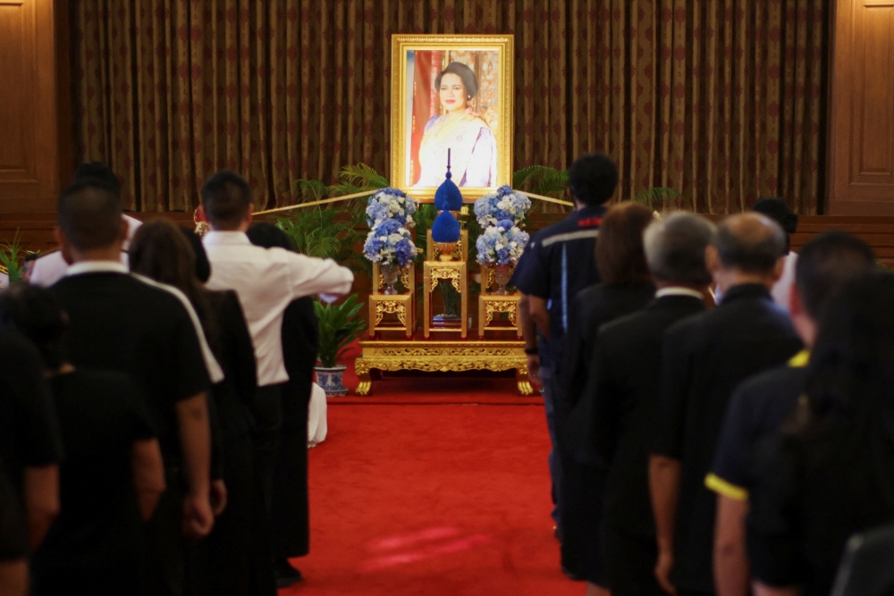 People queue to offer condolences for Thailand’s Queen Mother Sirikit following the announcement of her death, at the Sahathai Samakhom Pavilion inside the Grand Palace in Bangkok, Thailand, October 26, 2025. — Reuters pic 