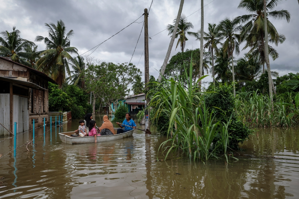 Three Penang schools shift to home-based learning as flood victims take over classrooms