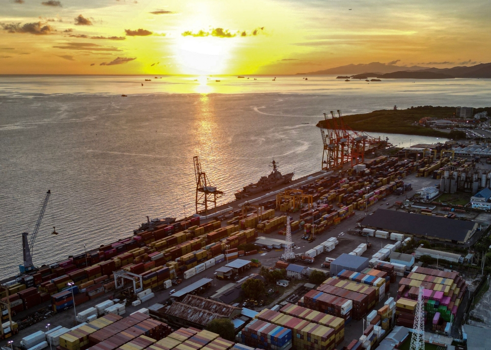 This aerial view shows the ‘USS Gravely’ warship docked in the port of Port of Spain October 26, 2025. — AFP pic