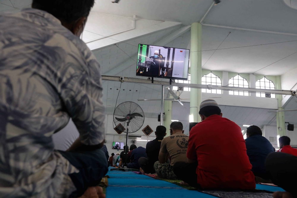 Muslims are seen during Friday prayers at the Seberang Jaya Mosque in Penang September 24,2021. — Picture by Sayuti Zainudin
